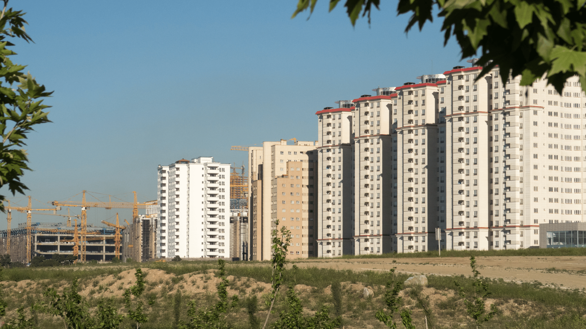 A high-rise building with numerous windows, potentially an apartment complex, in Addis Ababa.